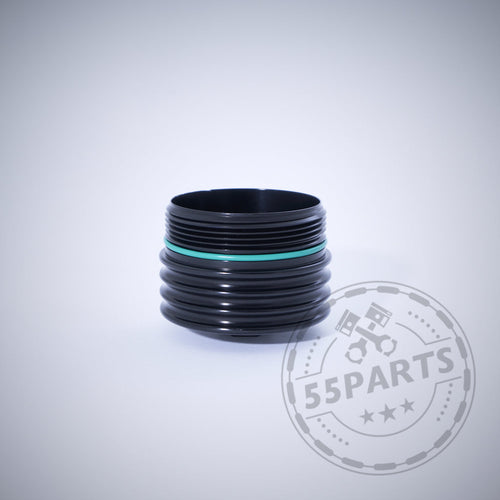 55Parts Exclusive Aluminium Ölfilterkappe mit Sechskant, schwarz gerippt mit türkisfarbenem Ring, passend für BMW Motoren wie N20, N57, N52, N53, N54, N55, S55, B46, B48, B57 und B58 – auf hellem Hintergrund abgebildet.